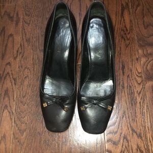 Louis Vuitton black heels with gold detail